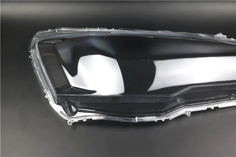 Transparent plastic headlight housing cover with 50mm x 30mm x 20mm dimensions