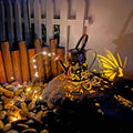 Solar garden lamp with butterfly pattern design and iron construction for outdoor lighting
