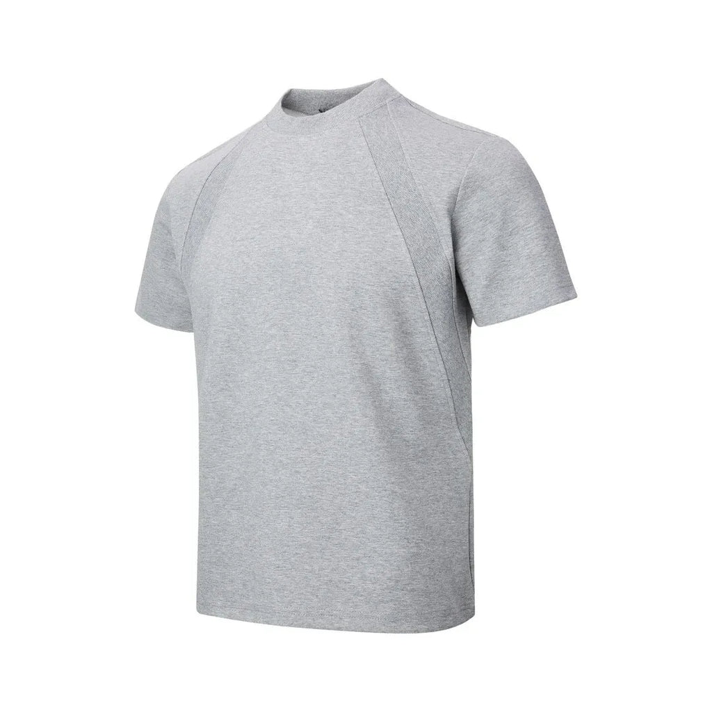 Black loose fit short sleeve top with air layer stitching detail on a hanger