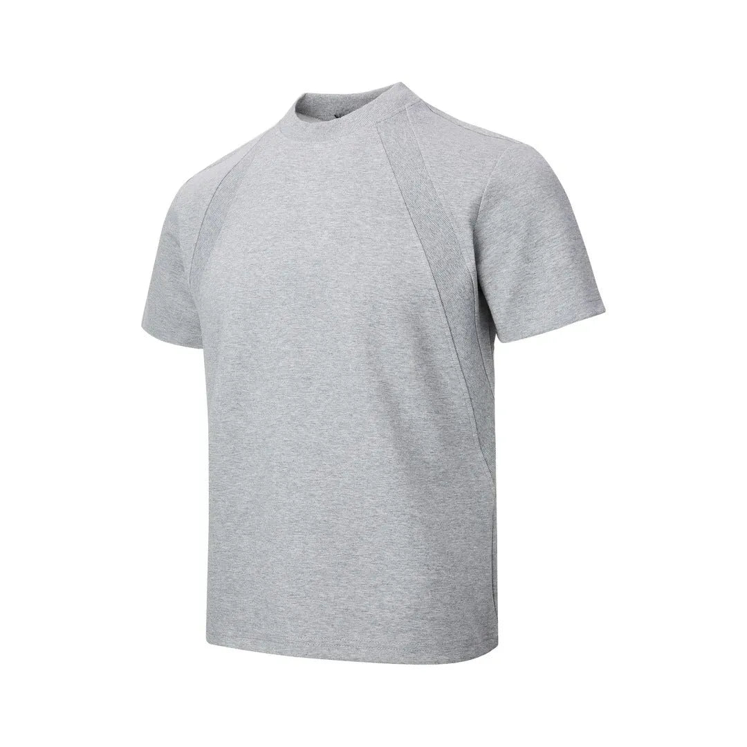 Black loose fit short sleeve top with air layer stitching detail on a hanger