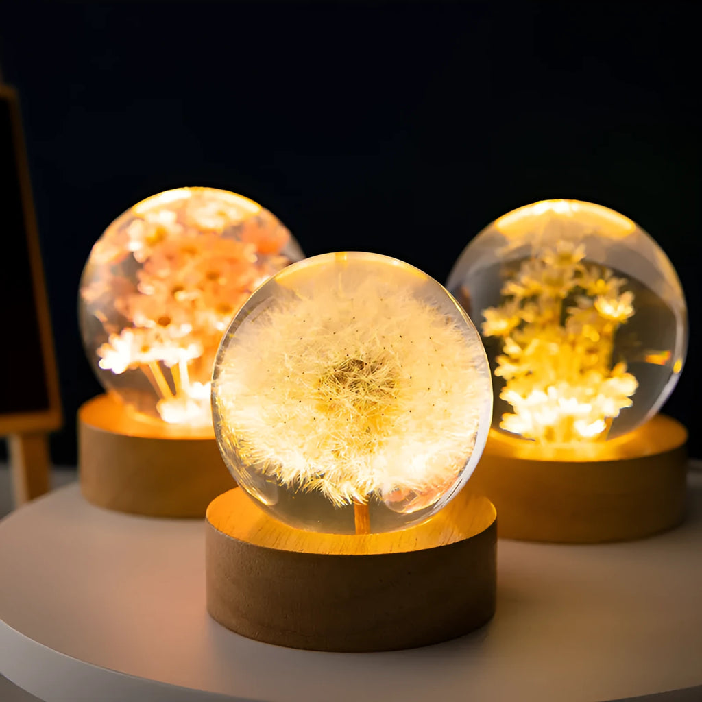 3D dandelion crystal ball night light on beech wood stand, showing 60mm resin sphere with internal flower.