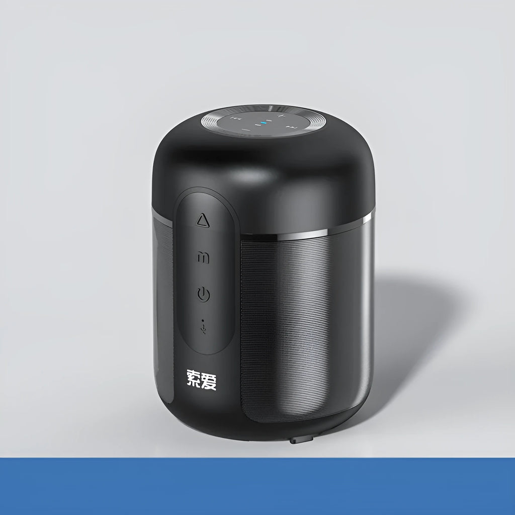 Black portable Bluetooth speaker with compact plastic cabinet, showing front speaker grille and control panel.