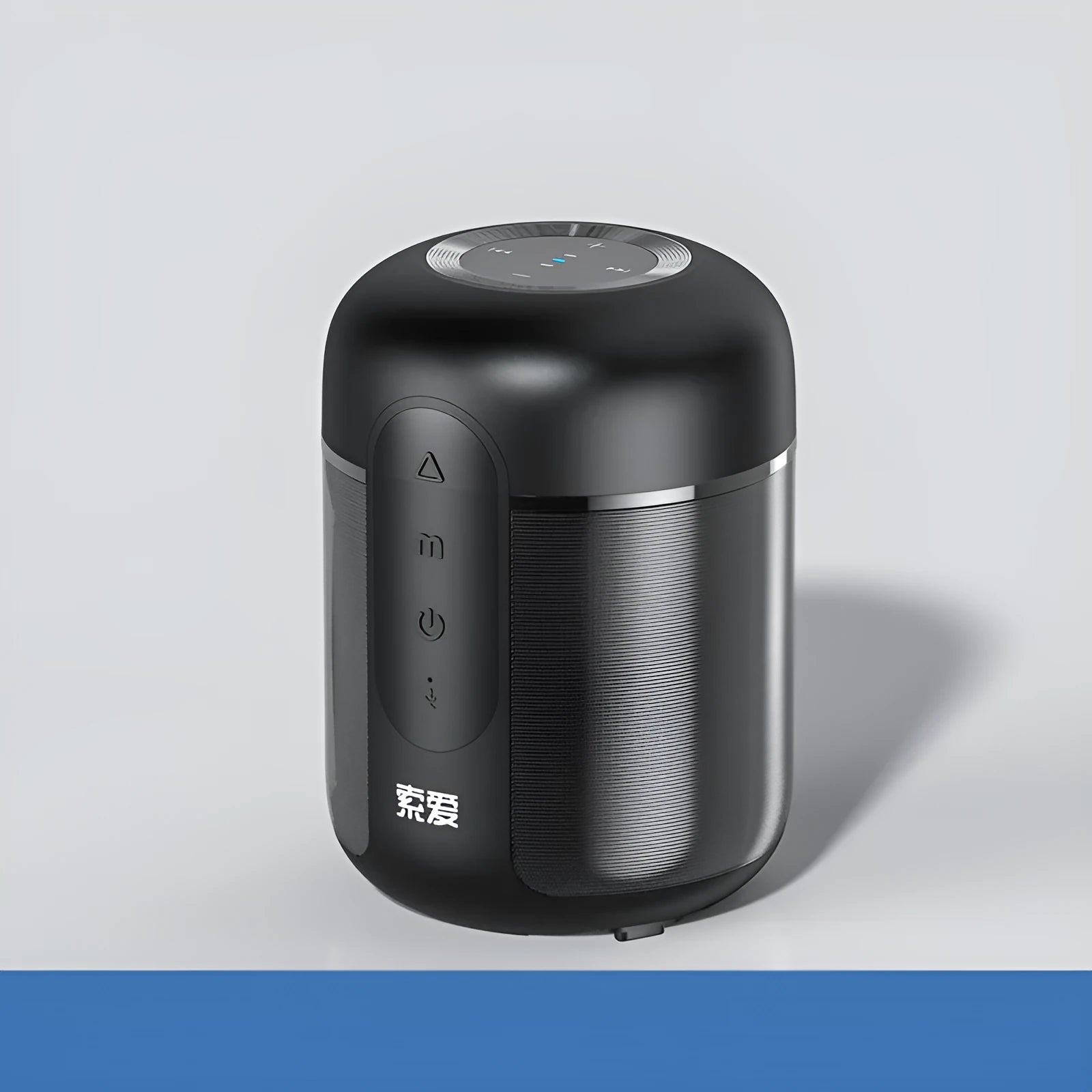 Black portable Bluetooth speaker with compact plastic cabinet, showing front speaker grille and control panel.