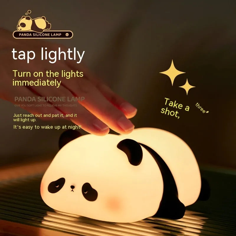 Cartoon panda night light with soft white glow on bedroom bedside table
