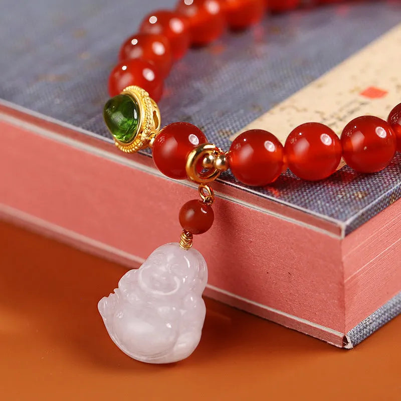 Handmade red agate and amber bracelet with Maitreya Buddha charm in Chinese geometric style.