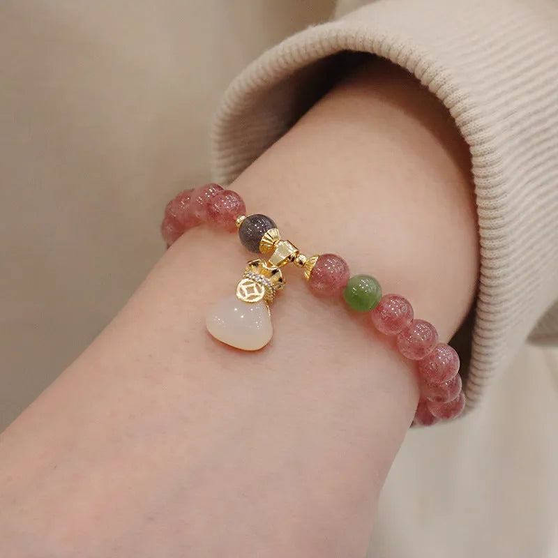 Strawberry quartz women's bracelet with geometric stone pattern and purse charm pendant