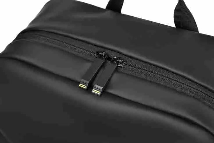 Black waterproof PU leather backpack for men with large capacity and computer compartment