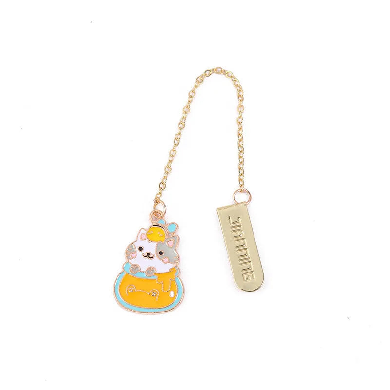 Jane Lime metal cat bookmark with food-themed designs including Strawberry Cake Cat and Cherry Sleeping Cat