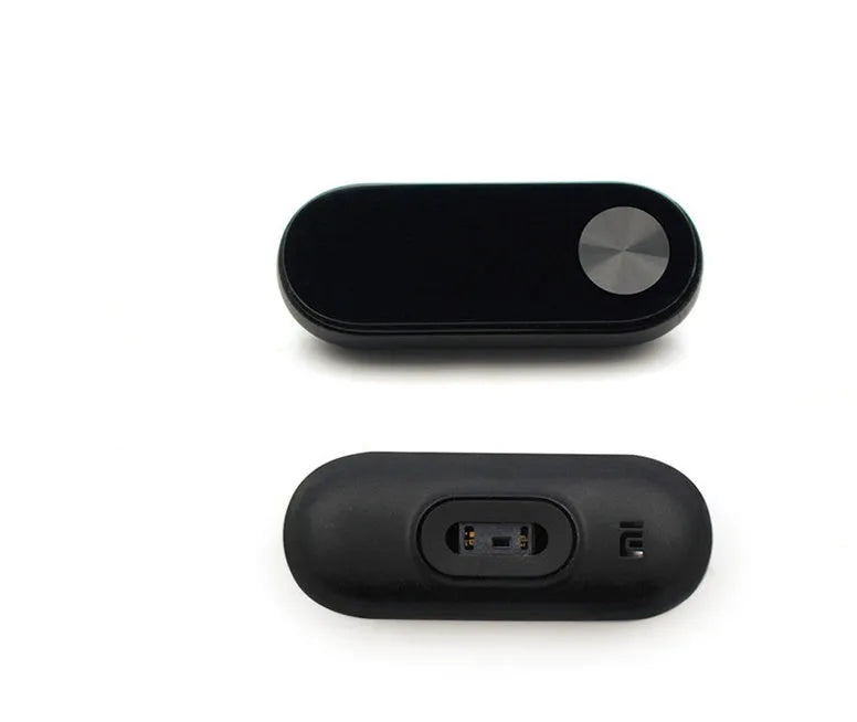 Xiaomi Mi Band 2 black fitness tracker with OLED display showing heart rate reading