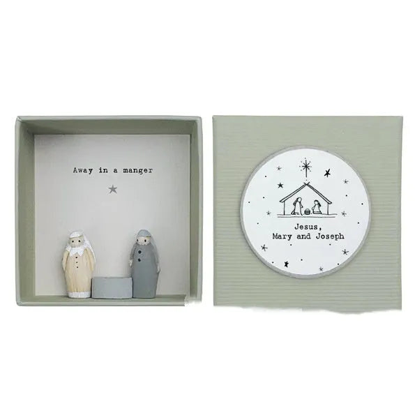 Boxed resin and plastic guardian angel figurine ornament in a modern cartoon style.