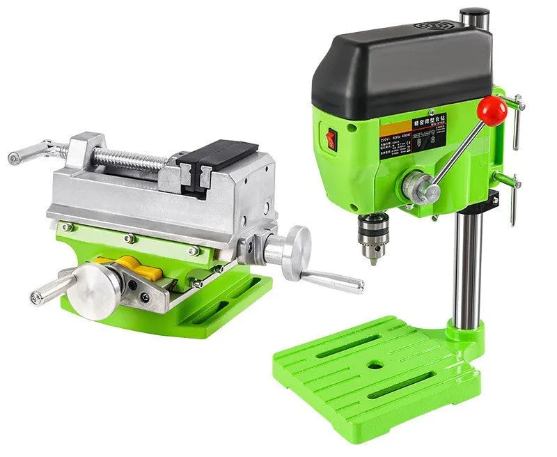 Mini bench drill and milling machine with included 1050W drill and metal bench pliers on a workbench.
