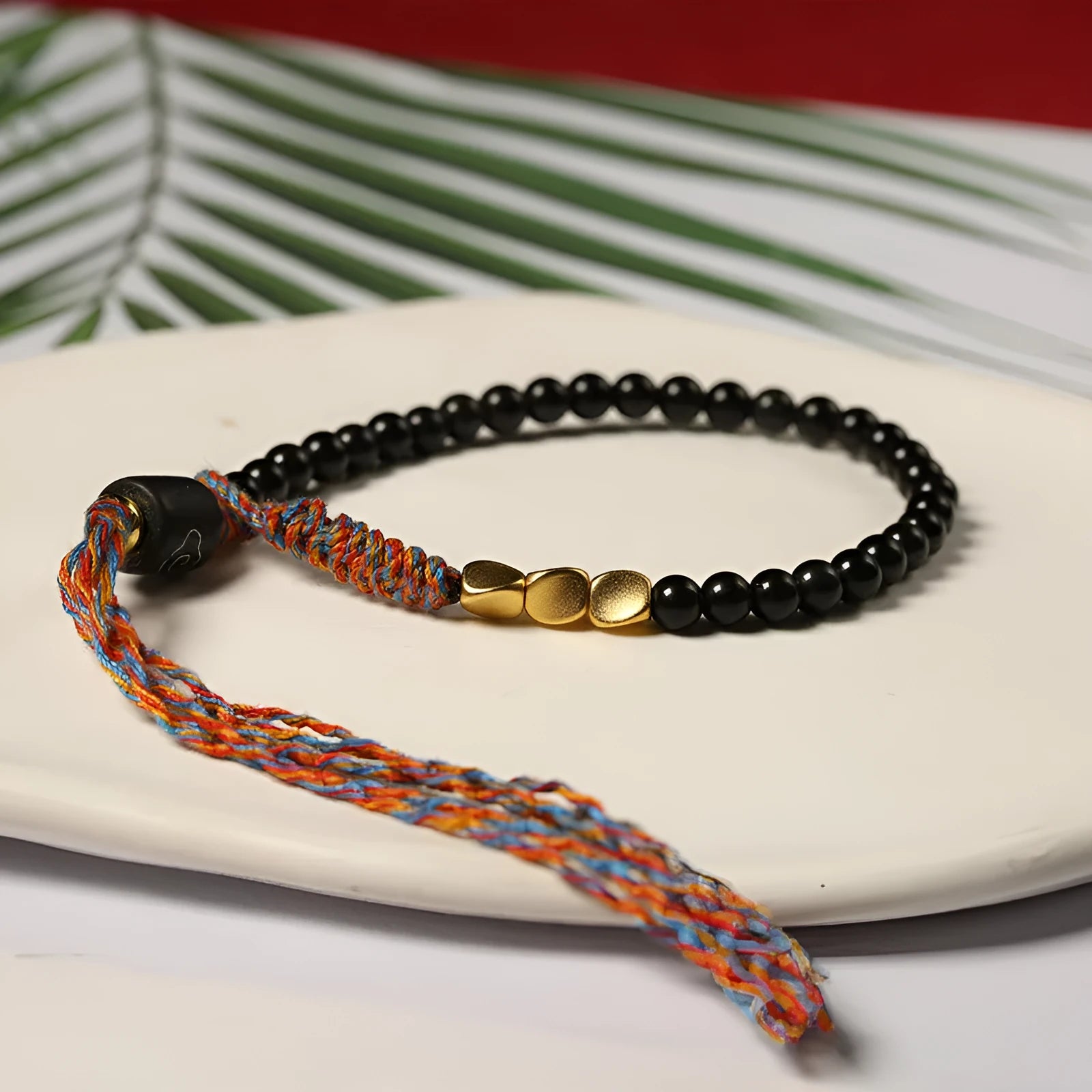 Hand-woven obsidian bracelet with 4mm width and 15.5-16cm adjustable length