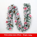 PVC Christmas rattan garland with flocking in red, hung on a door