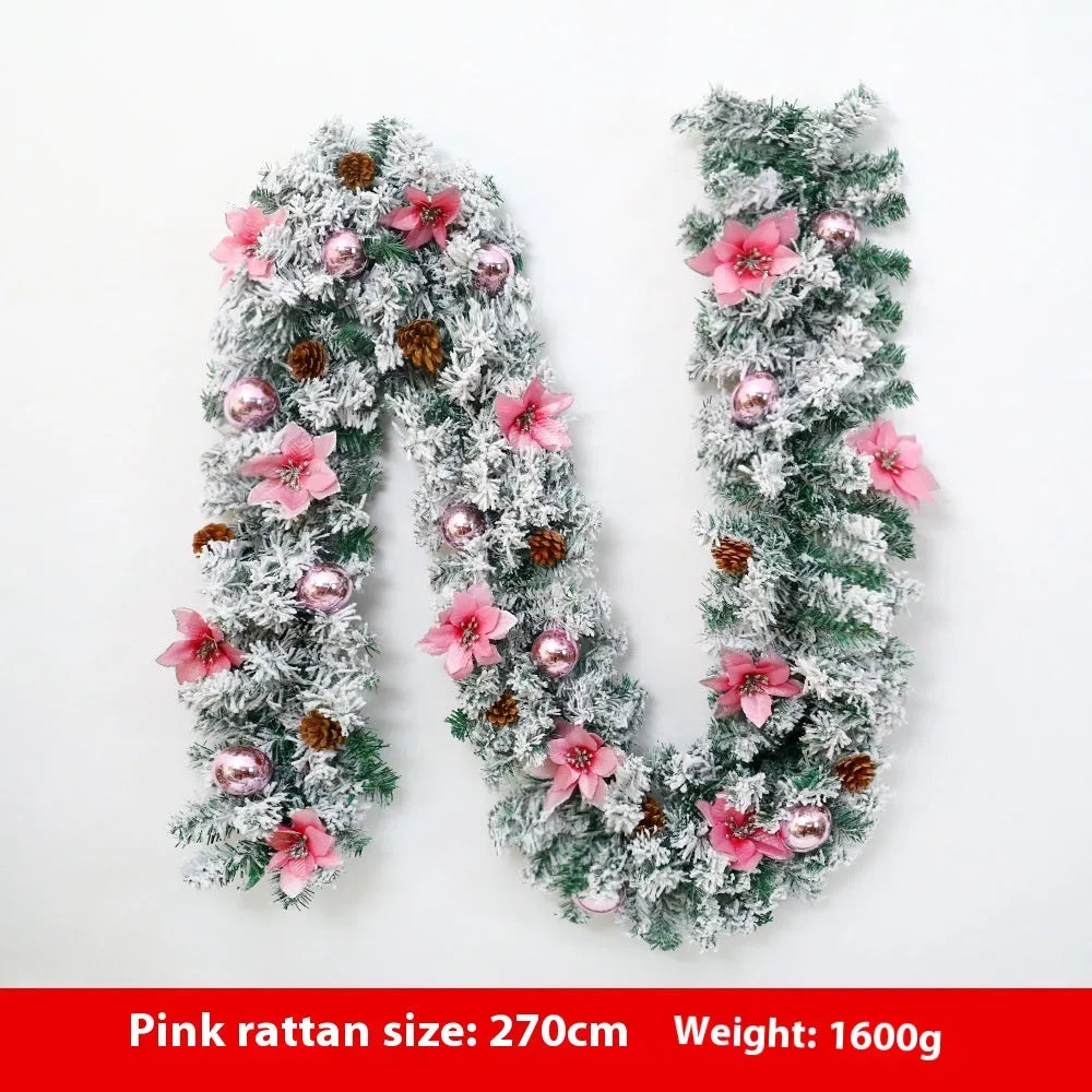 PVC Christmas rattan garland with flocking in red, hung on a door