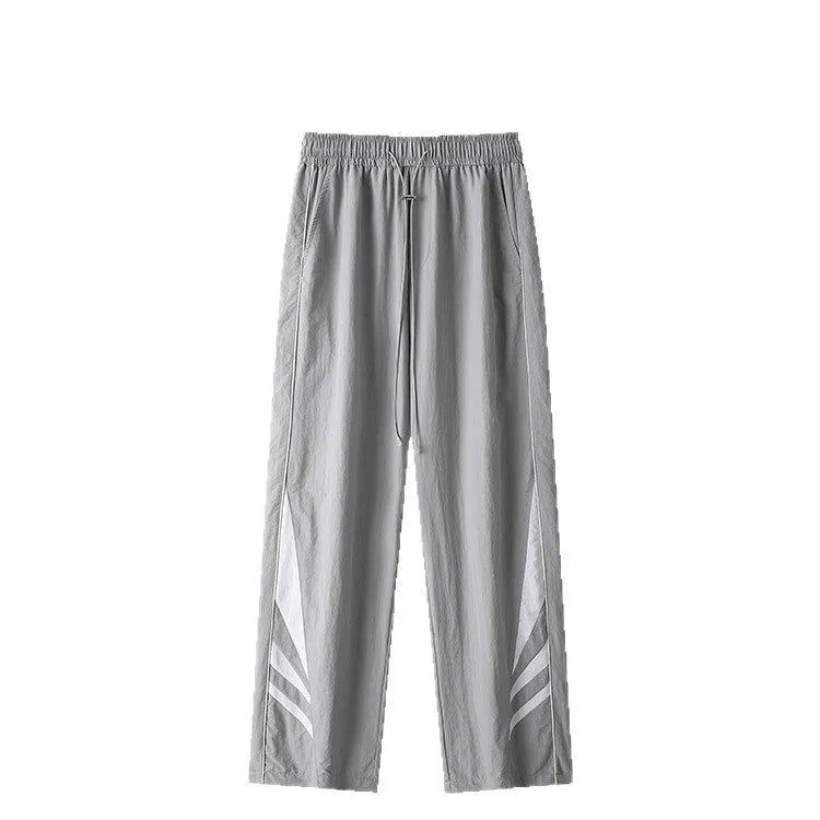 Men's black straight leg sports trousers with elastic waistband shown on hanger
