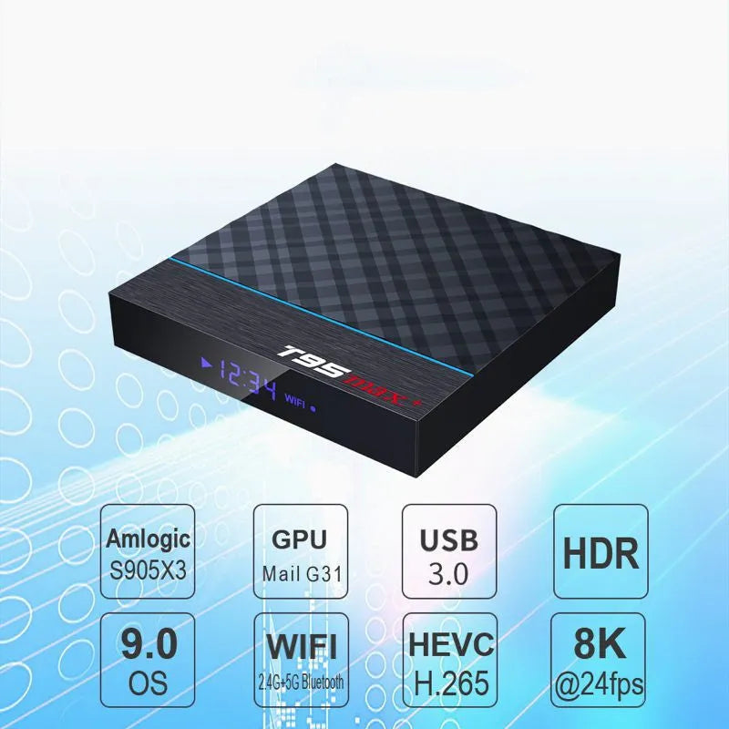 Black T95 Max Plus Android TV box unit with remote control and UK power plug adapter on a table.