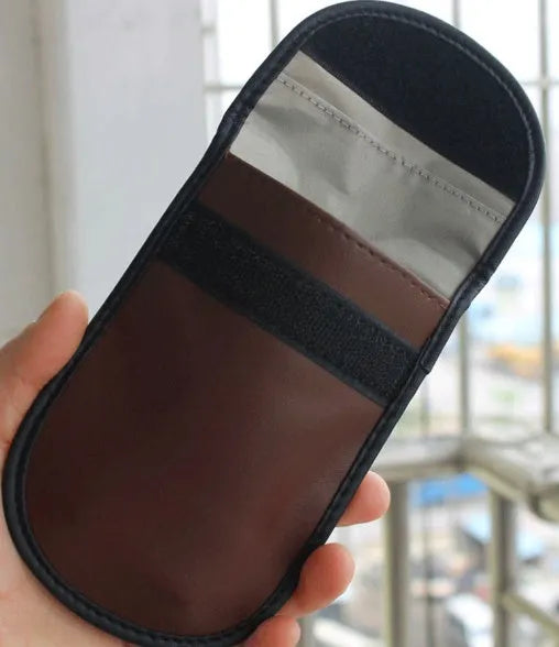 Black microfiber RFID signal blocker bag for phones and cards measuring 13.5 by 9.5 centimetres
