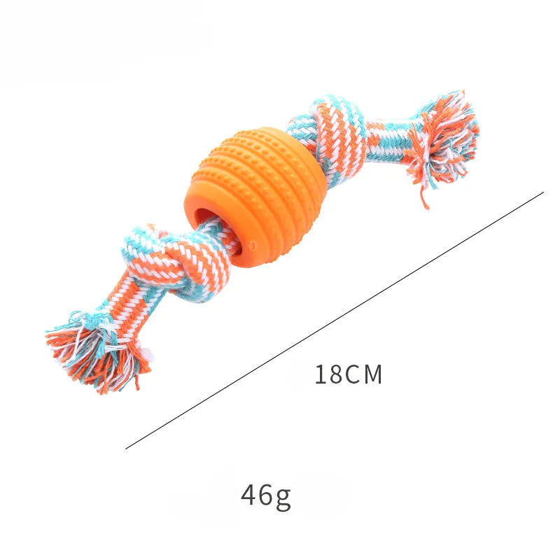 Set of four colourful soft dog chew toys with molar shapes and rope ends on a white background.