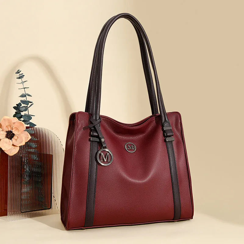 Soft PU leather women's crossbody bag in retro style with double straps, shown in a choice of five colours.