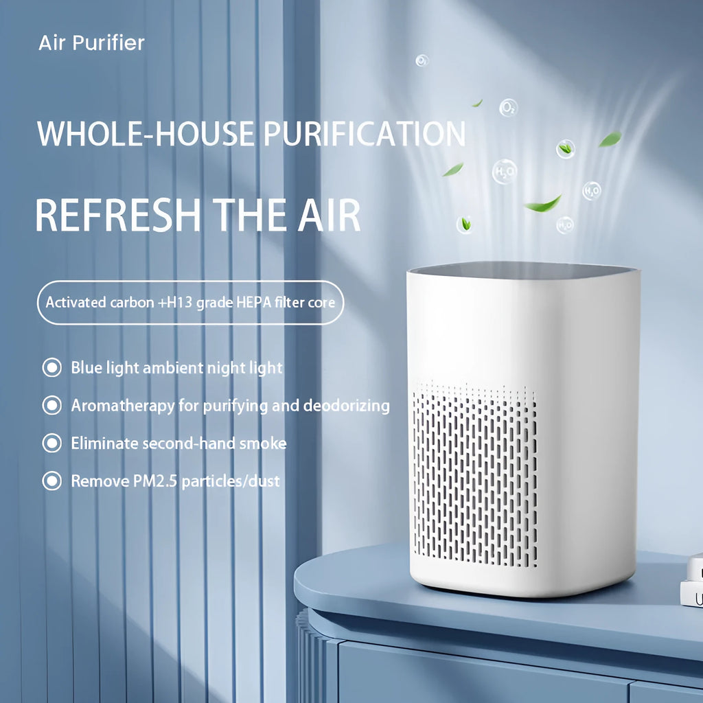 Compact white desktop air purifier with USB cable on wooden desk