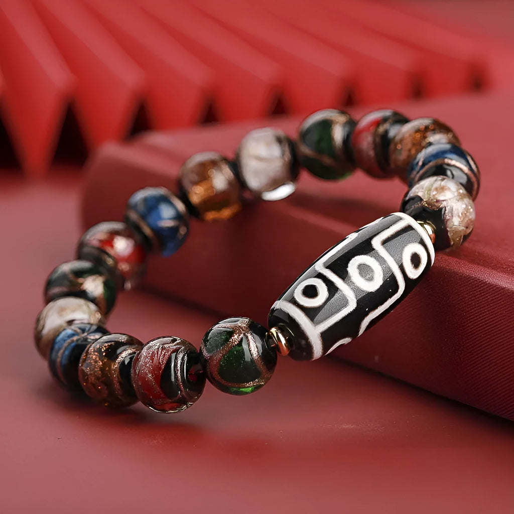Chinese-style coloured glaze bracelet with five-colour snake lucky beads and auspicious patterns.