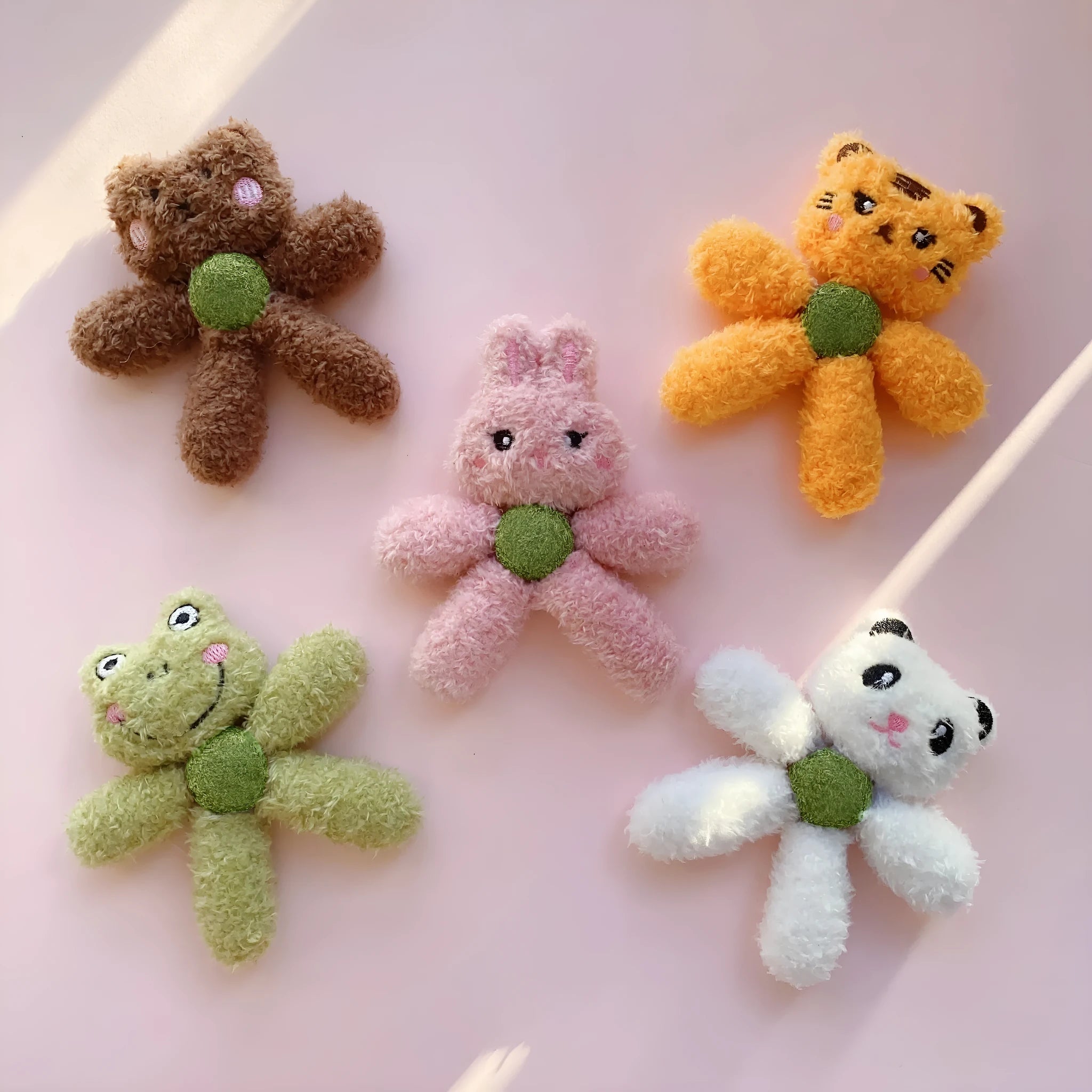 Edible catnip ball chewing toy in animal shapes for cleaning cat teeth.