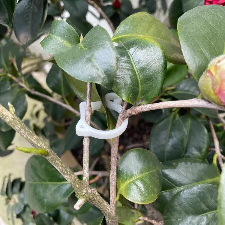 Cat-shaped plastic plant clip for garden training in red, yellow, green, or white colours