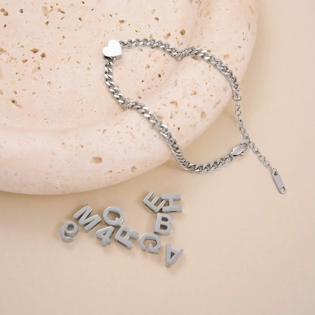 Personalised titanium steel necklace with a letter charm on a 40.5cm electroplated chain.