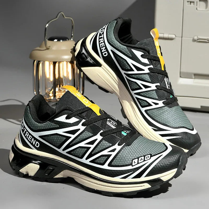 Unisex low-top lace-up leisure hiking shoes in a sport style with a round toe and flat rubber sole.