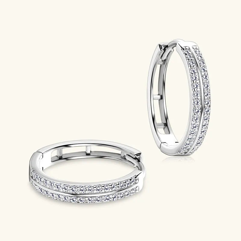 Pair of straight sterling silver earrings with moissanite stone geometry shape