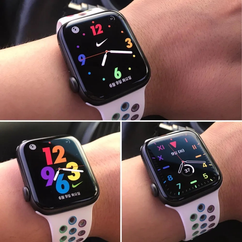 Silicone sports wristband with single buckle strap in black rainbow or white colour options