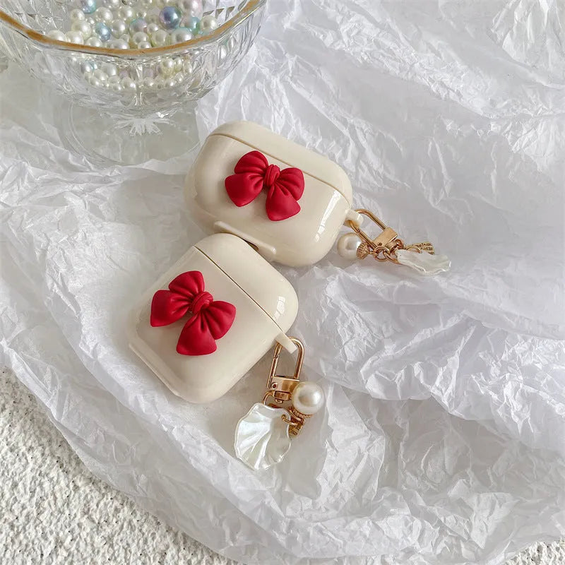 Beige red TPU clamshell earphone case with bow shell design for AirPods protection