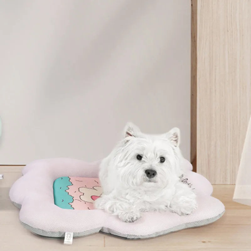 Green ice silk cooling mat for a medium-sized dog resting on the floor.