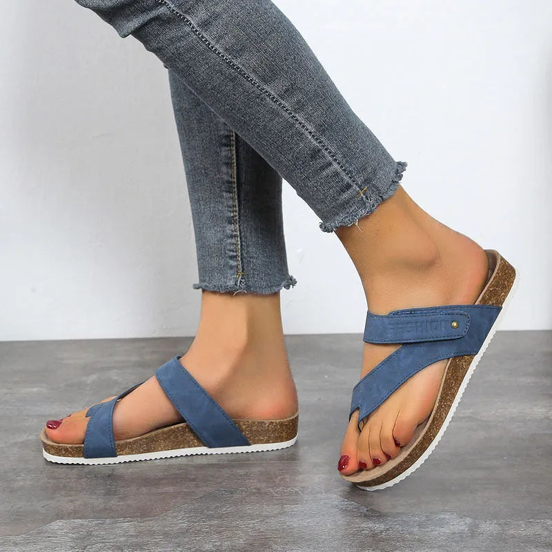 Women's flat toe ring flip-flops with a thick foam sole, shown in a solid colour.