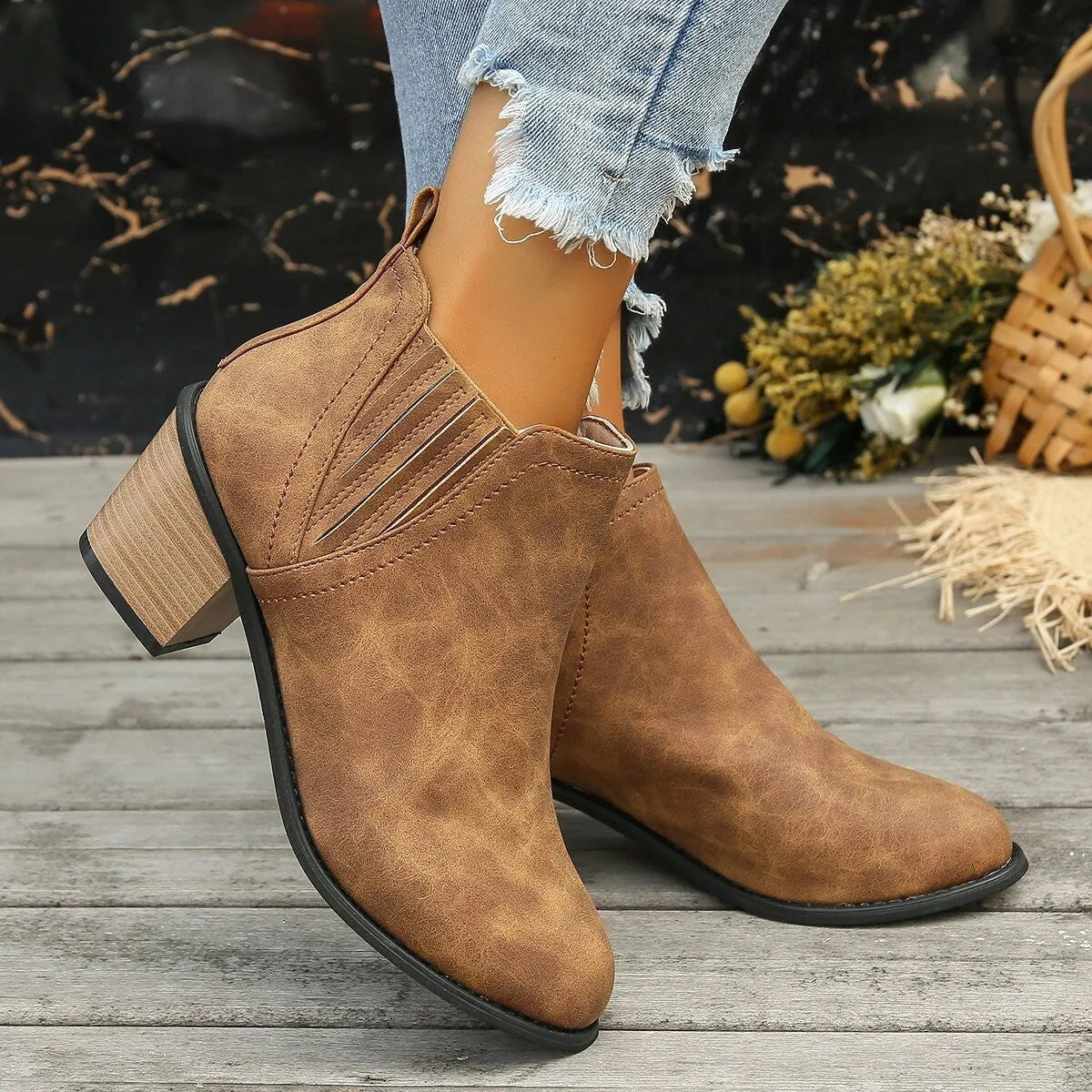Women's black slip-on ankle boots with pointed toe and thick square heel