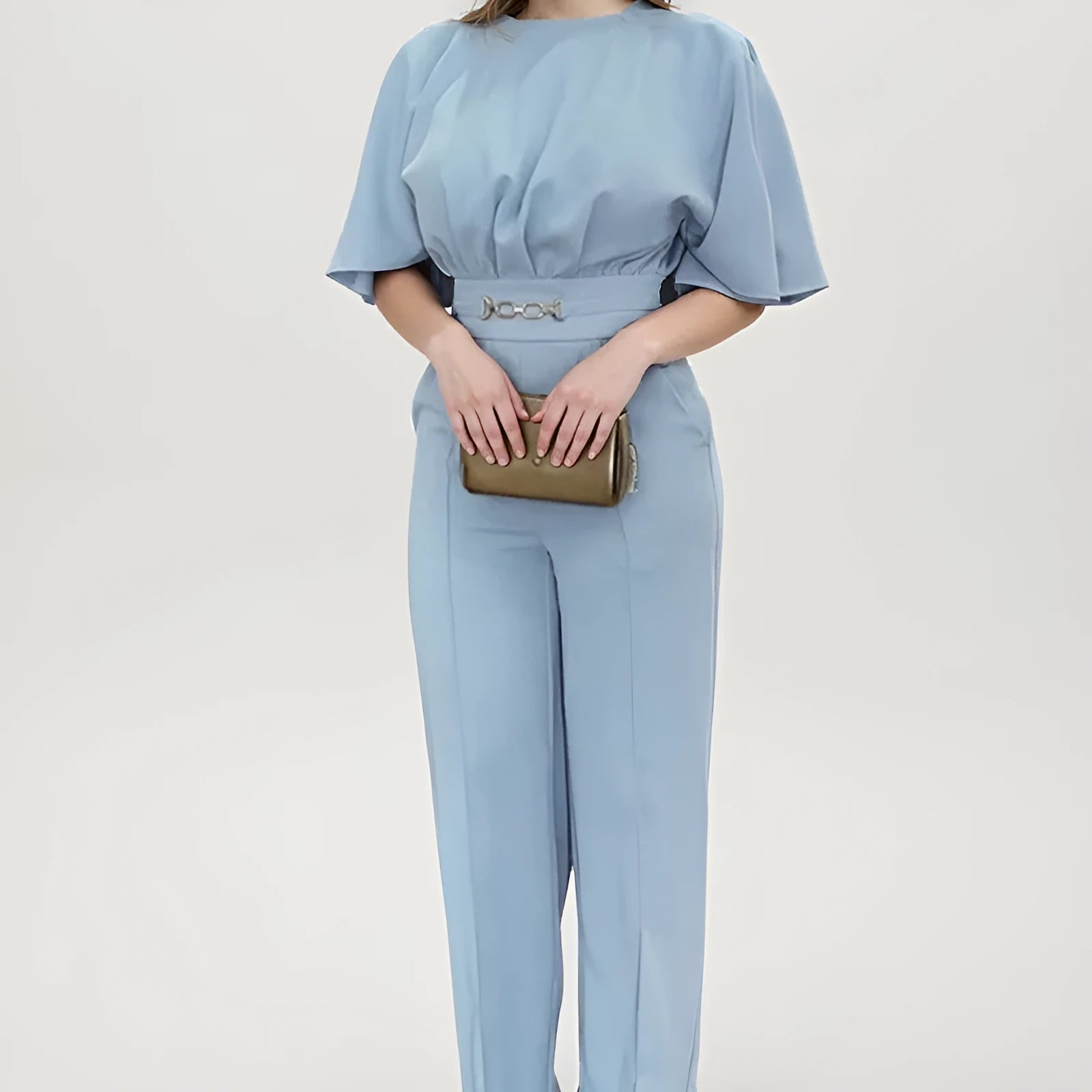 Blue men's two-piece casual suit with long sleeves and trousers on a model