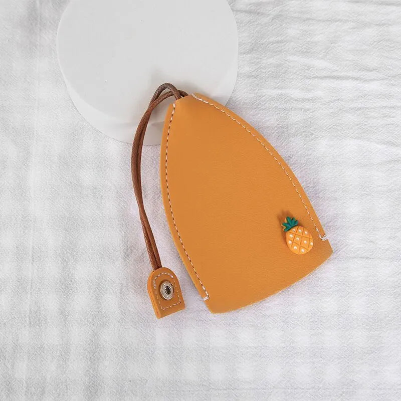 Cartoon style pull-out car key case made from PU leather in assorted designs