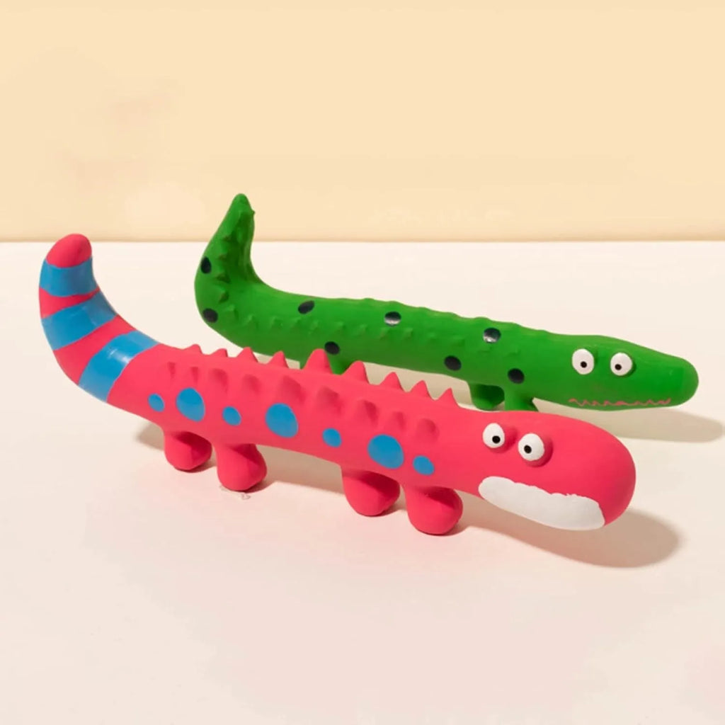 Green cartoon lizard-shaped dog chew toy with squeaker function on white background