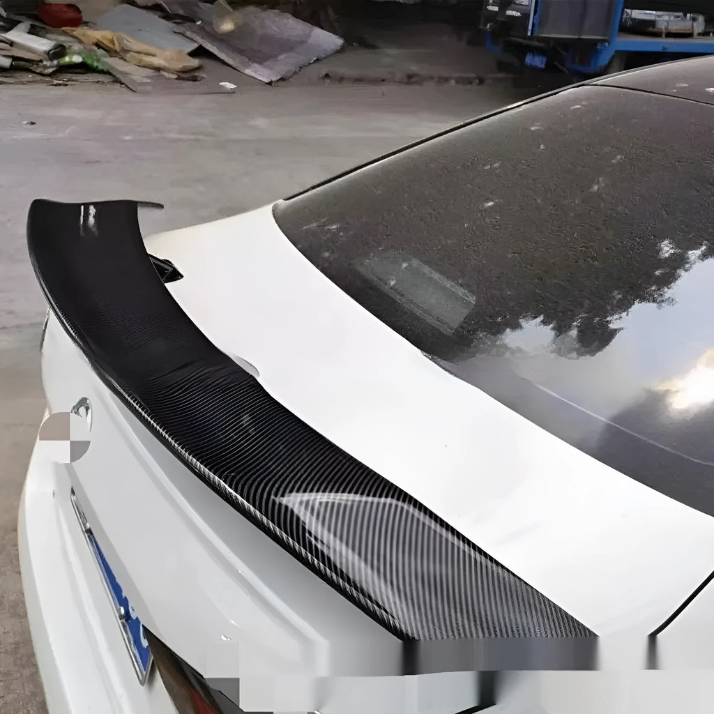 Universal punch-free car tail wing spoiler in ABS material showing four finish options