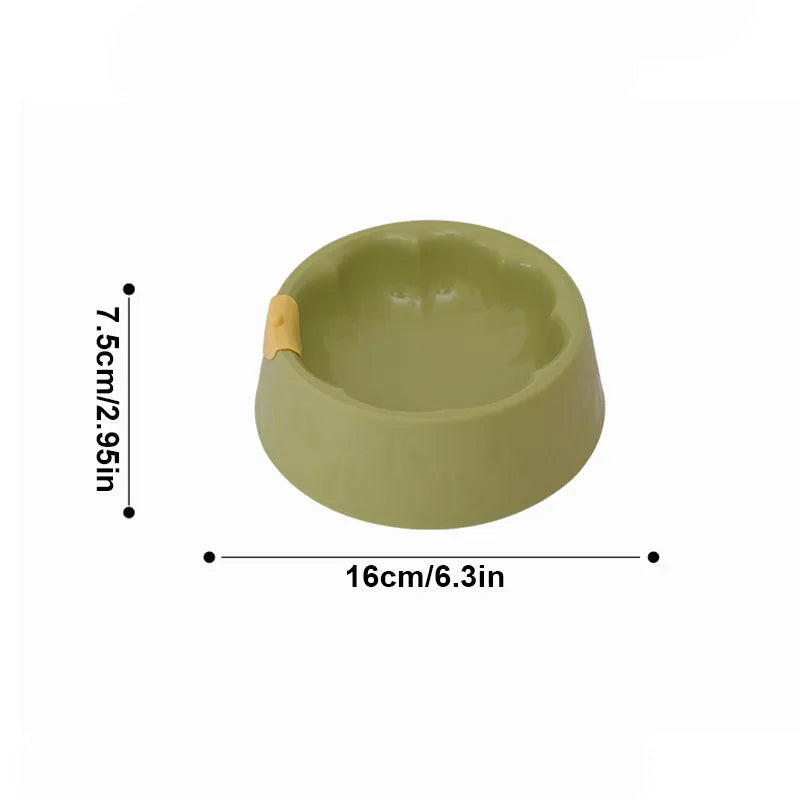 Green flower-shaped plastic pet bowl for cat or small dog food and water