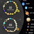 Two natural stone beaded bracelets for zodiac signs laid out side by side.