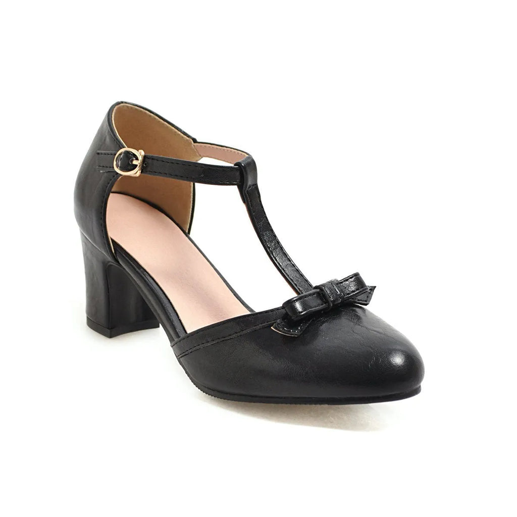 Women's chunky heel sandals with bow tie design and adjustable buckle strap in apricot colour