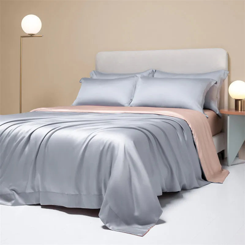 Lenzing Tencel quilt cover and sheet set in a modern colour like Aurora Blue, showing satin weave texture.