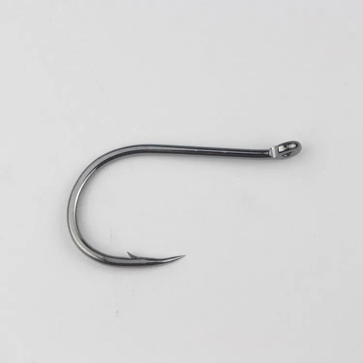 Barbed fishing hooks with hole ring in a bulk pack on a blue background.