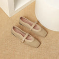 Women's beige mesh low-heel pump with square toe and buckle fastening on a white background.