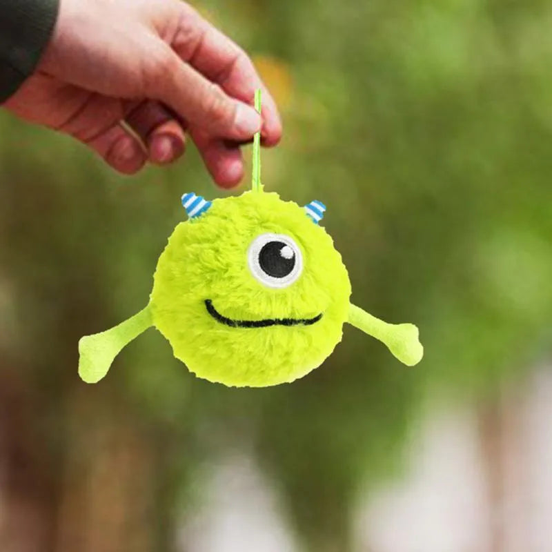 Green sound-activated interactive dog teething ball toy with flexible plush and TPR construction