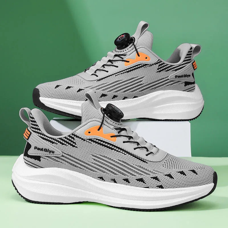 Men's low-top white green sports running shoe with rotating buckle and lace-up closure on a TPU sole.