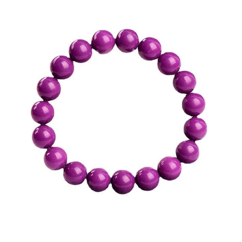 Polished purple mica crystal unisex bracelet in a single ring design on a white background.