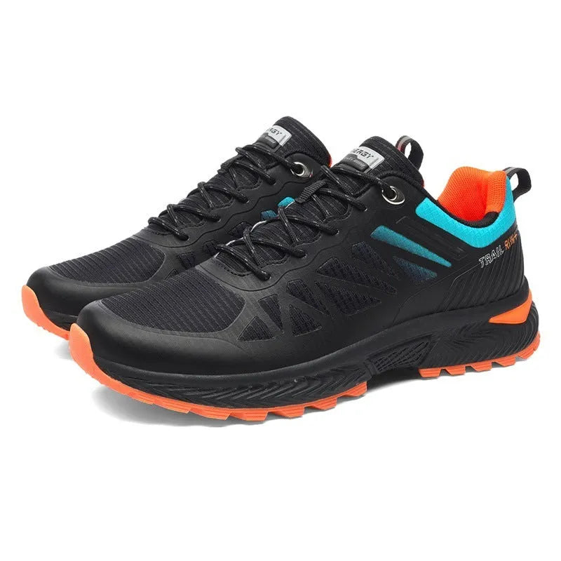 Men's black and orange breathable mesh running shoe with lace-up front and rubber sole, shown in plus sizes.