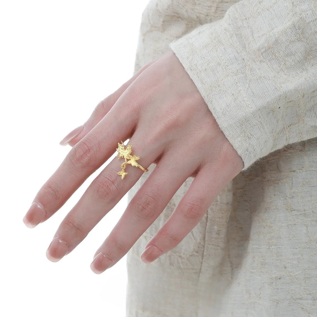Adjustable silver butterfly ring showing electroplated finish in either white gold or 18K gold colour option.